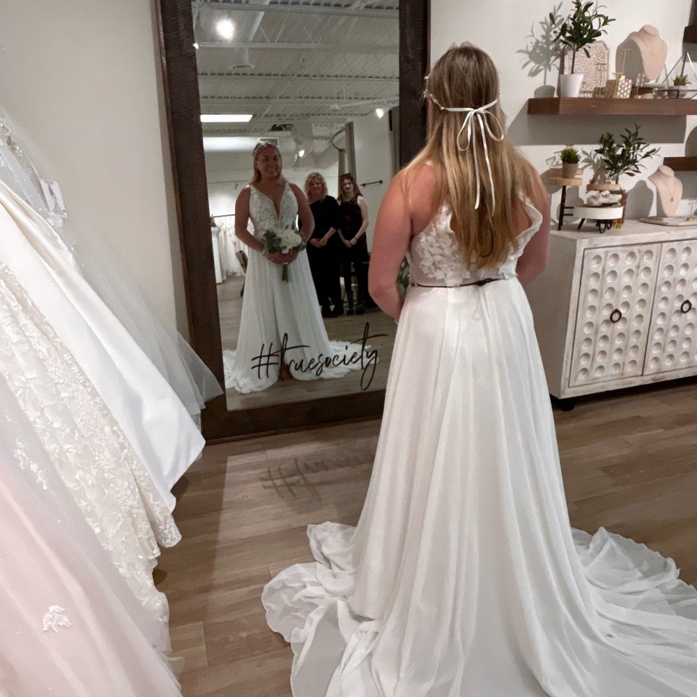 Beautiful wedding gown. Barely worn. Size 12, minimal alterations.